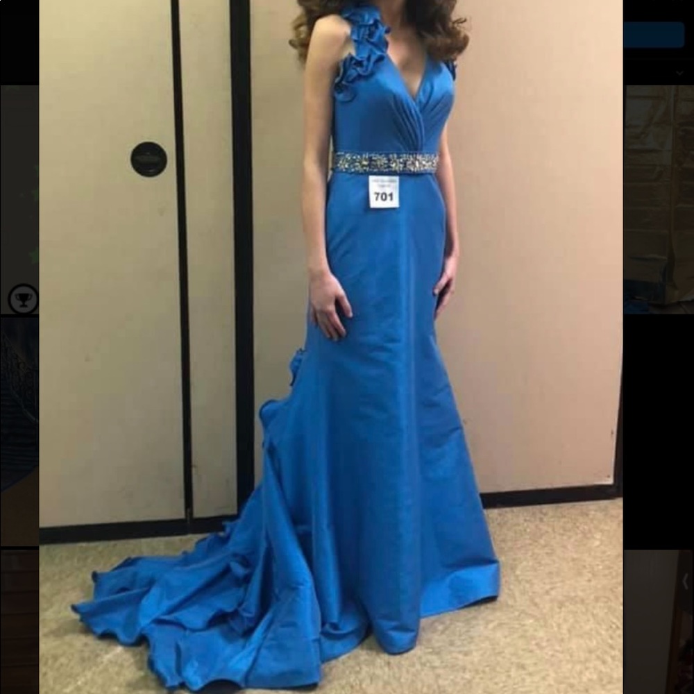 Gorgeous blue pageant dress with ruffle halter neck and long ruffle train